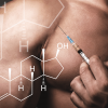 male injecting testosterone in his shoulder